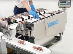 自動排出機構付卓上データウェイ™での計量作業